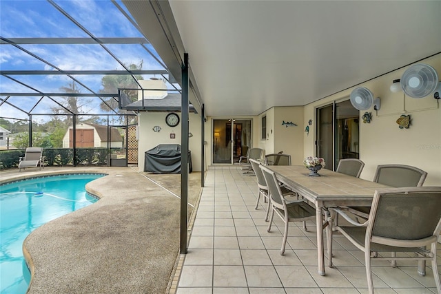 12338 S Putney Ct, Leesburg, FL 34788 - pool featuring glass enclosure, outdoor dining area, a patio, and area for grilling