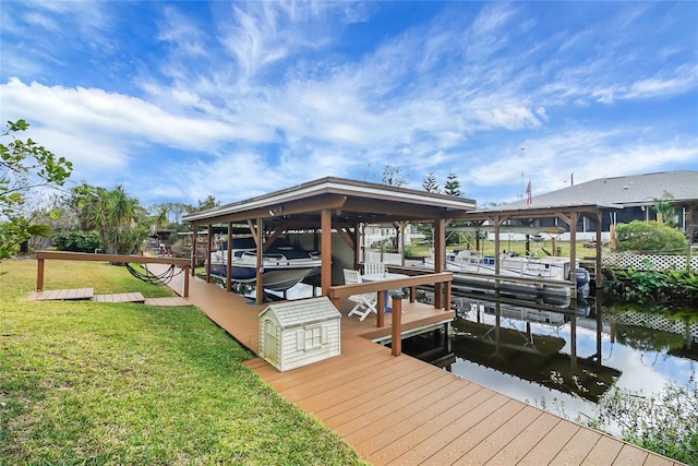 12338 S Putney Ct, Leesburg, FL 34788 - dock area featuring a water view, a yard, and boat lift