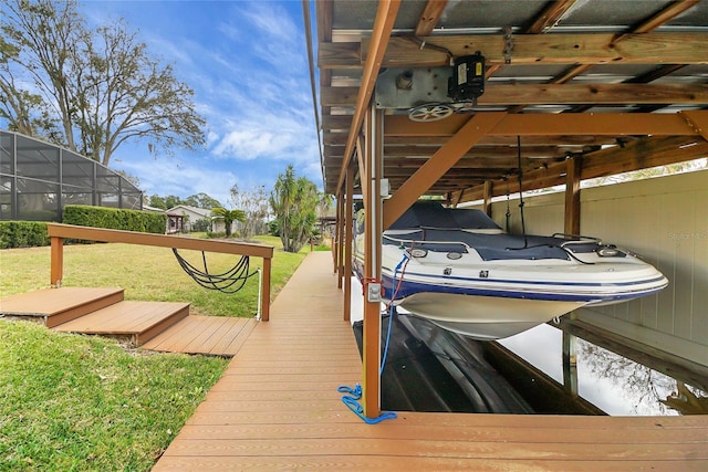 12338 S Putney Ct, Leesburg, FL 34788 - view of dock with a lawn and boat lift