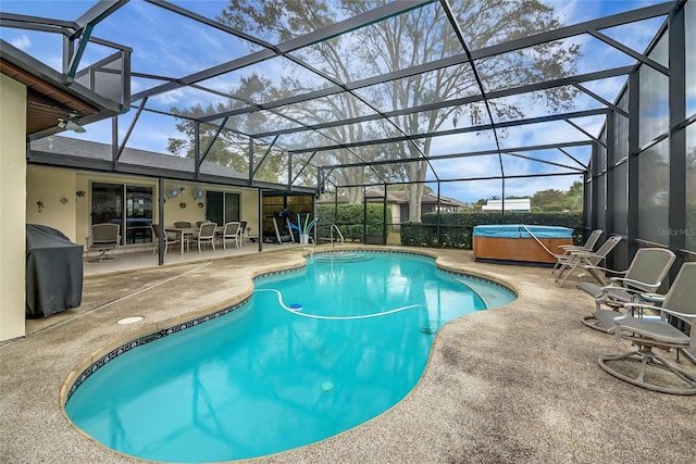 12338 S Putney Ct, Leesburg, FL 34788 - outdoor pool with a patio, a lanai, a grill, and a hot tub