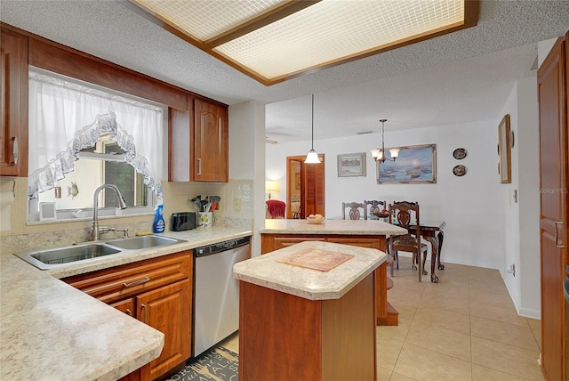 12338 S Putney Ct, Leesburg, FL 34788 - kitchen with pendant lighting, light countertops, a sink, dishwasher, and a peninsula