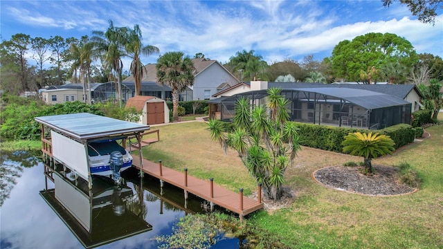 12338 S Putney Ct, Leesburg, FL 34788 - exterior space with glass enclosure, a water view, boat lift, and a lawn