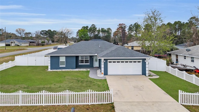 ranch-style home with an attached garage, concrete driveway, a fenced front yard, and a front yard