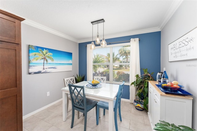 dining area with light tile patterned floors, baseboards, and ornamental molding