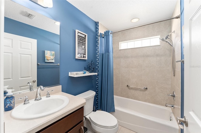 bathroom featuring a textured ceiling, toilet, shower / tub combo, vanity, and visible vents