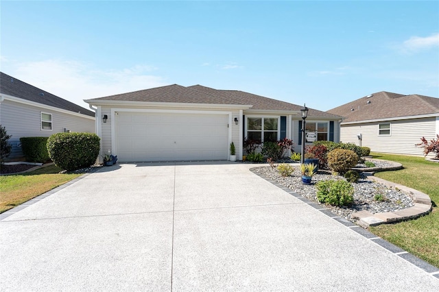 single story home with a garage, driveway, and a shingled roof