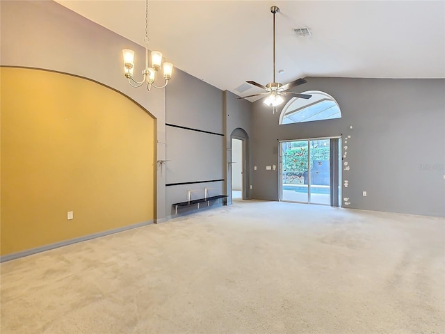 unfurnished living room featuring arched walkways, carpet, visible vents, high vaulted ceiling, and ceiling fan with notable chandelier