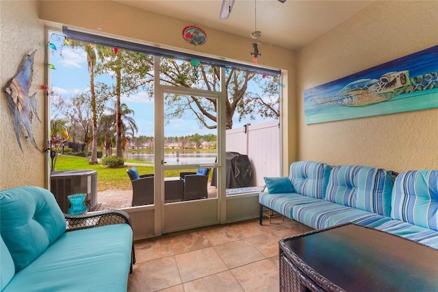 sunroom with a water view