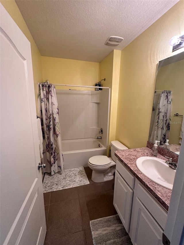 bathroom featuring visible vents, toilet, shower / tub combo, vanity, and tile patterned flooring