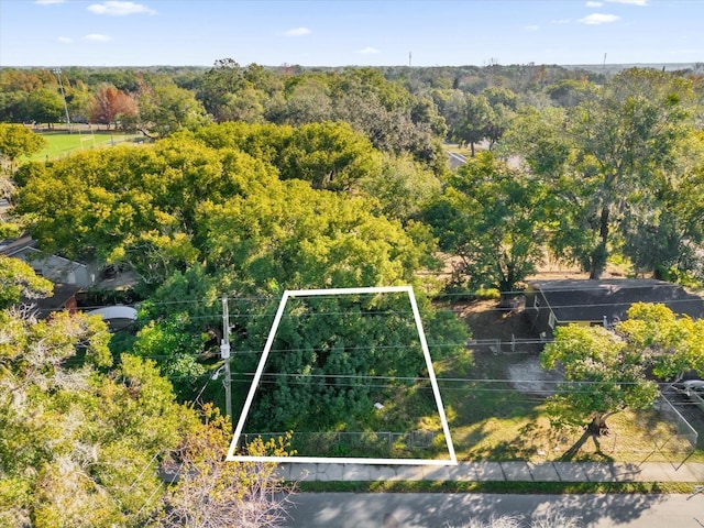 aerial view featuring a forest view