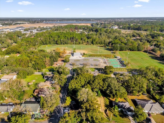 aerial view featuring a wooded view