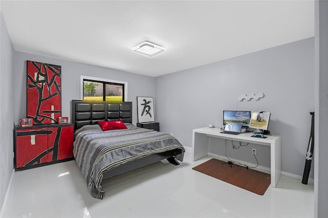 bedroom featuring baseboards