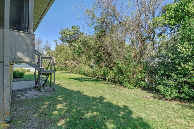 view of yard featuring stairs