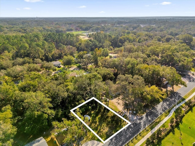 bird's eye view featuring a view of trees