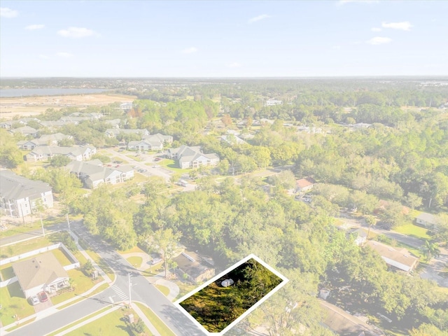 drone / aerial view with a forest view