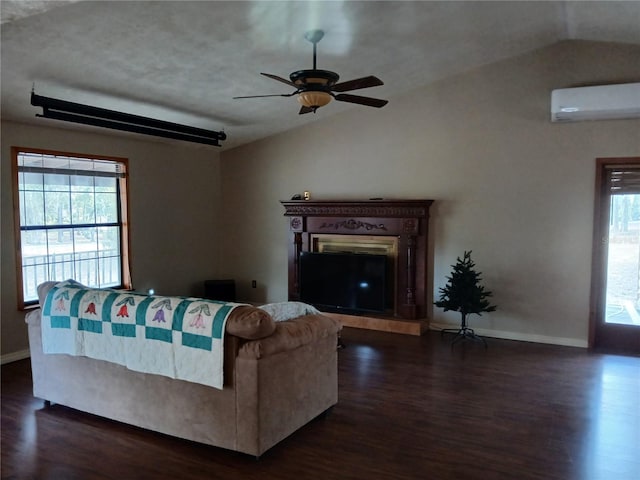 living room with lofted ceiling, dark wood-style flooring, a wall mounted AC, and baseboards