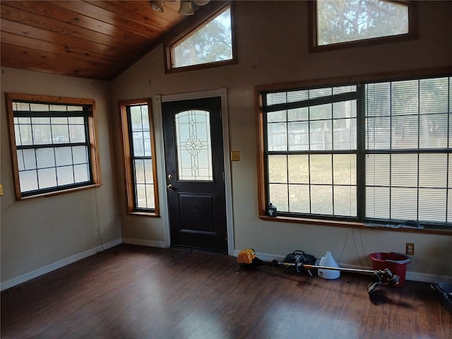 foyer featuring lofted ceiling, wooden ceiling, baseboards, and dark wood-style flooring