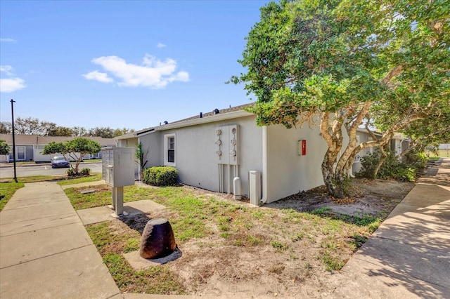 view of property exterior with stucco siding