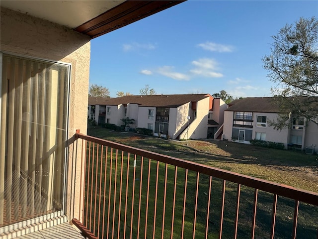 balcony featuring a residential view