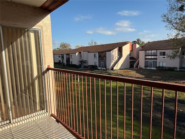 balcony featuring a residential view