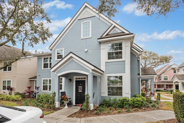 view of front facade featuring stucco siding