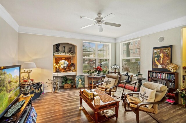 3368 Parkchester Square Blvd Unit 104, Orlando, FL 32835 - living area featuring ornamental molding, a ceiling fan, wood finished floors, and baseboards