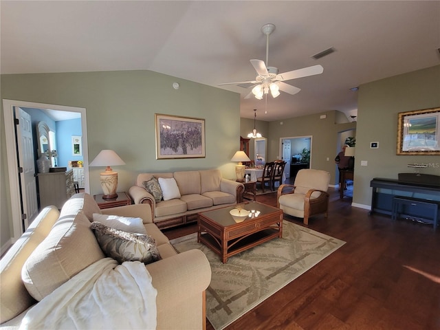 living area with lofted ceiling, ceiling fan, wood finished floors, visible vents, and baseboards