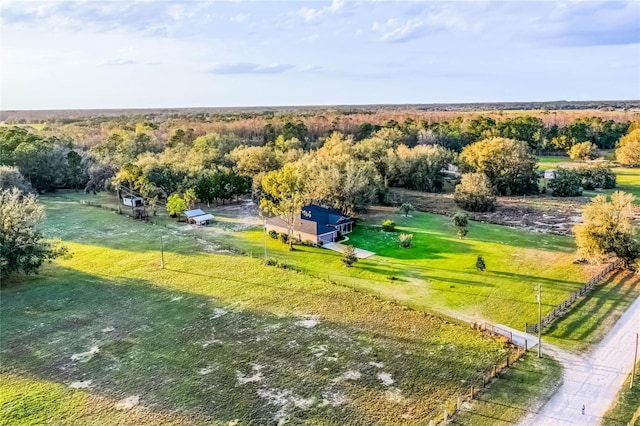 birds eye view of property featuring a rural view