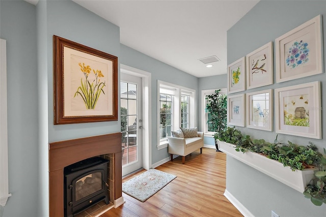 interior space with light wood-type flooring and baseboards