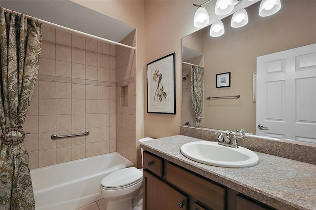 bathroom with shower / bath combo, vanity, and toilet