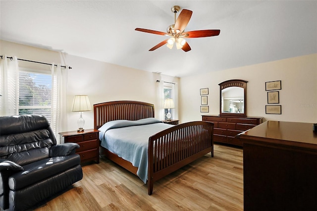 bedroom with light wood-style floors and ceiling fan