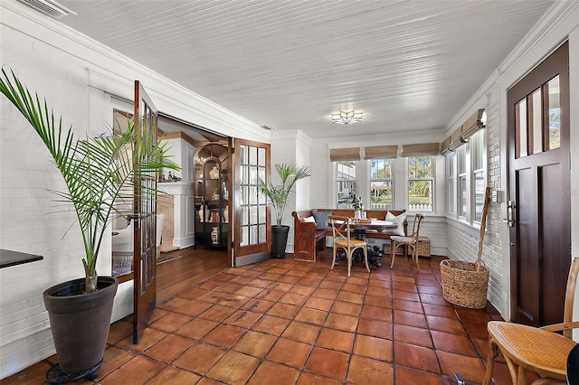 sunroom featuring visible vents