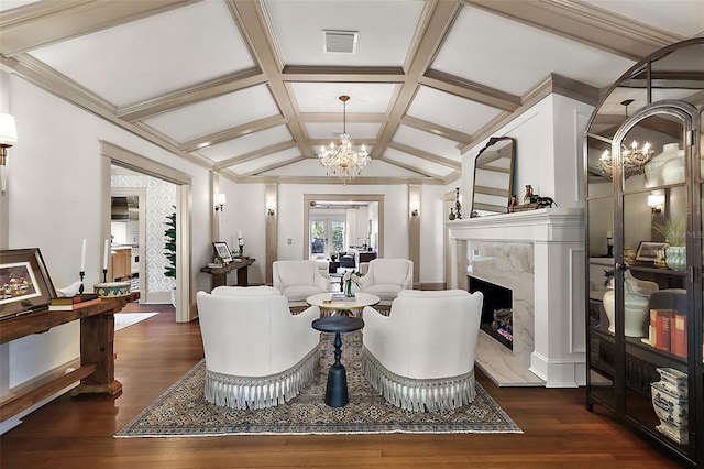 living room featuring visible vents, coffered ceiling, a premium fireplace, dark wood-style flooring, and a chandelier