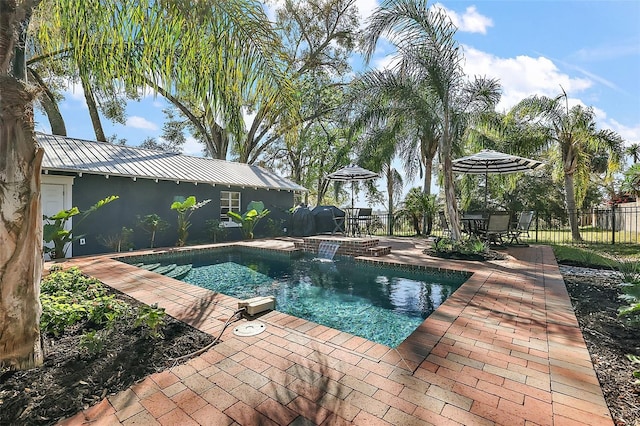 view of pool featuring a patio, fence, and a fenced in pool