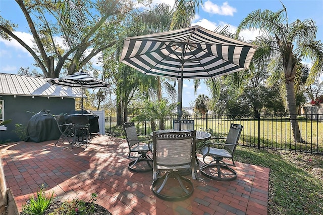 view of patio / terrace with fence and outdoor dining area