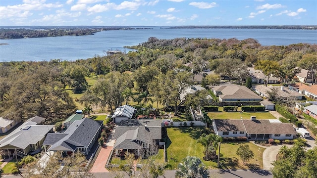 birds eye view of property featuring a water view and a residential view