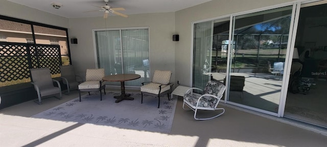 view of patio with ceiling fan and visible vents