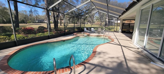 view of swimming pool with glass enclosure, a patio area, and a pool with connected hot tub