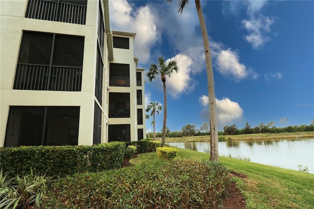 view of building exterior featuring a water view