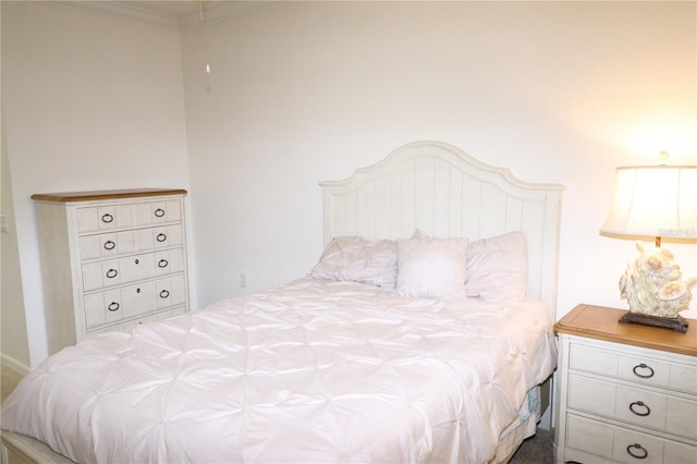 bedroom featuring ornamental molding