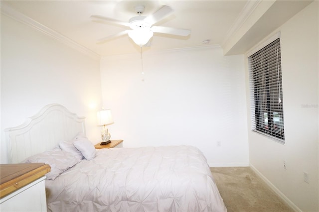 bedroom featuring ornamental molding, light carpet, ceiling fan, and baseboards