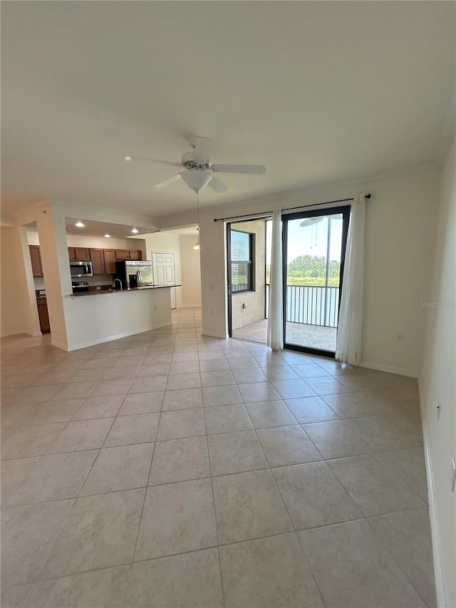 7005 River Hammock Dr Unit 207, Bradenton, FL 34212 - unfurnished living room with light tile patterned flooring, recessed lighting, and ceiling fan