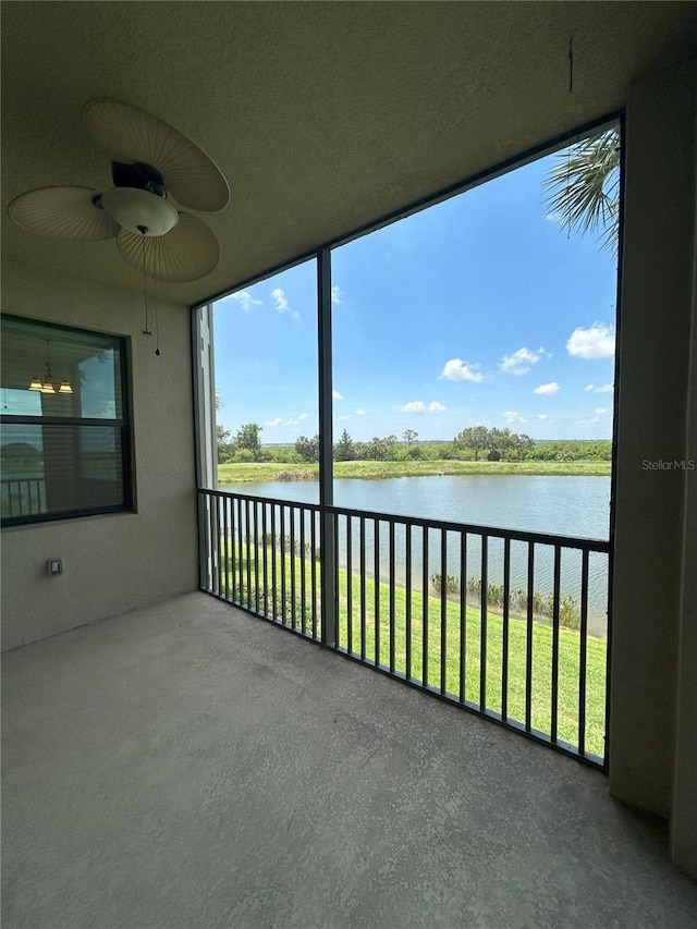 7005 River Hammock Dr Unit 207, Bradenton, FL 34212 - balcony with a water view and a ceiling fan