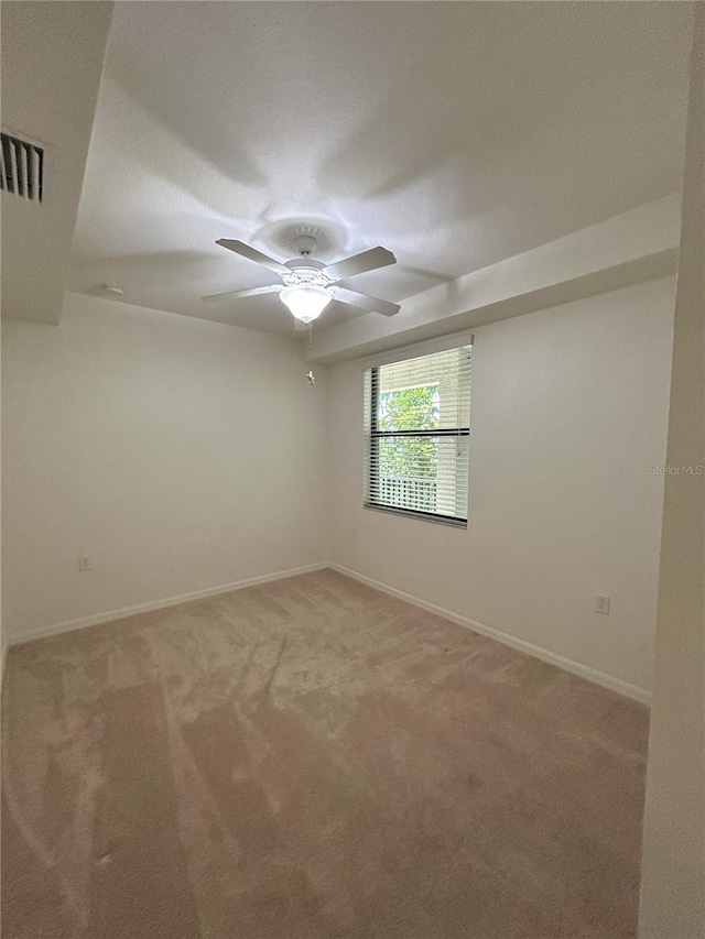 7005 River Hammock Dr Unit 207, Bradenton, FL 34212 - empty room featuring light carpet and ceiling fan