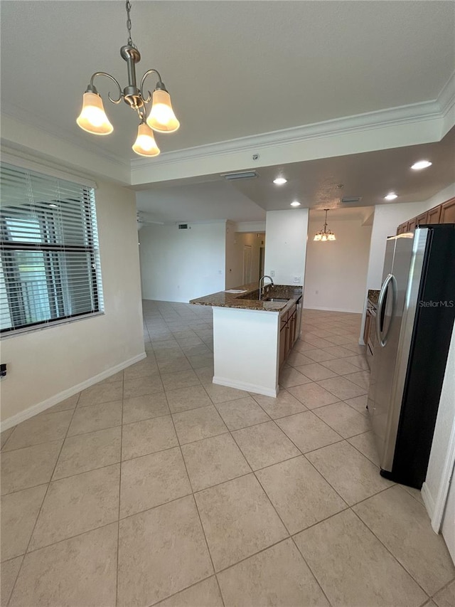 7005 River Hammock Dr Unit 207, Bradenton, FL 34212 - kitchen with a chandelier, stainless steel fridge with ice dispenser, crown molding, open floor plan, and light tile patterned flooring