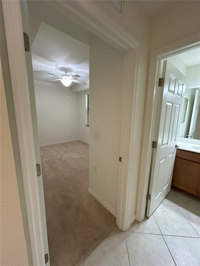 7005 River Hammock Dr Unit 207, Bradenton, FL 34212 - corridor with light colored carpet and baseboards