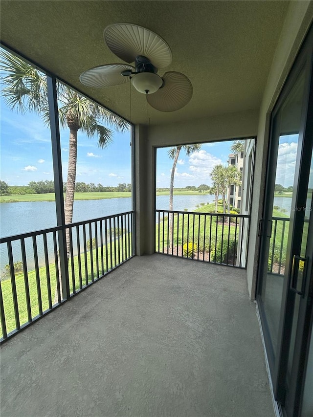 7005 River Hammock Dr Unit 207, Bradenton, FL 34212 - balcony featuring a water view and a ceiling fan