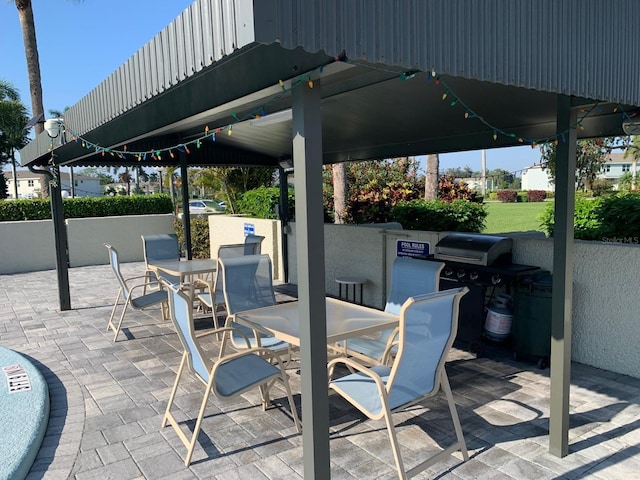 view of patio with outdoor dining area