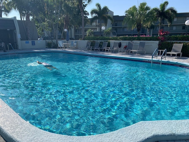 pool featuring fence