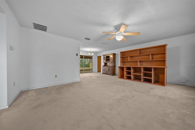 unfurnished living room with carpet floors, visible vents, baseboards, and ceiling fan with notable chandelier